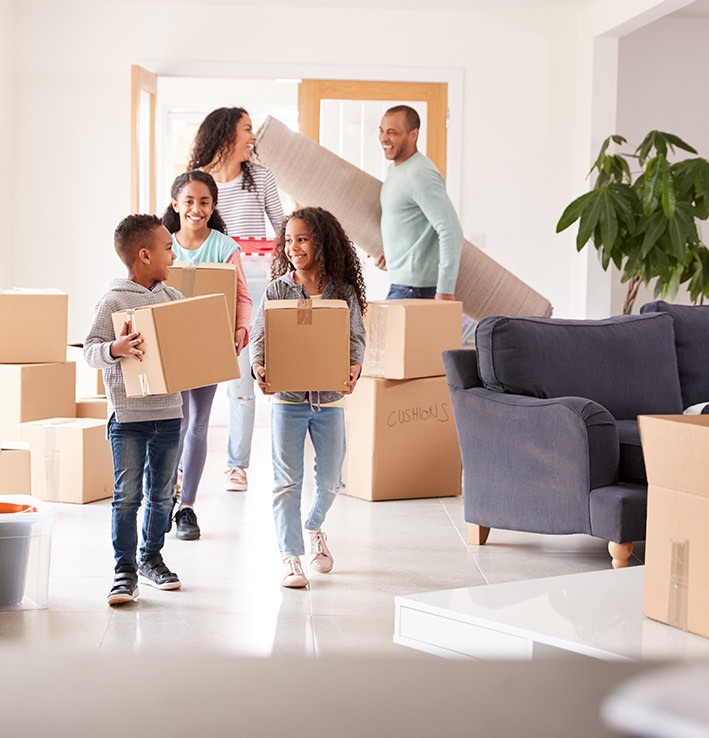 Happy family moving into new home image